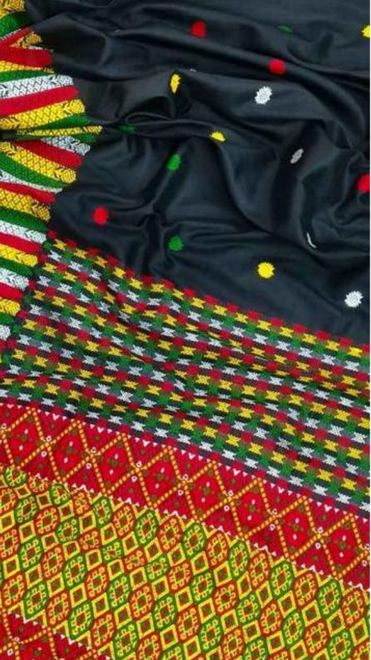 Side view of Assam Colour Motif Silk Saree showing the graceful drape and fluid fall of pure mulberry silk with vivid handwoven traditional motifs