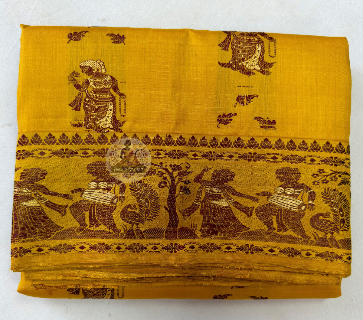 Detail view of traditional Baluchari buti motifs handwoven across the body of Baluchari Pure Silk Saree, revealing the fine weave precision and natural silk lustre of Bengal's three-hundred-year devotional textile tradition