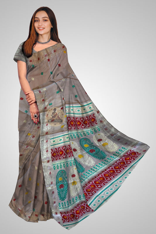 Handwoven Baluchari Mulberry Silk saree in deep teal with full narrative pallu, elegant front drape view on Indian model