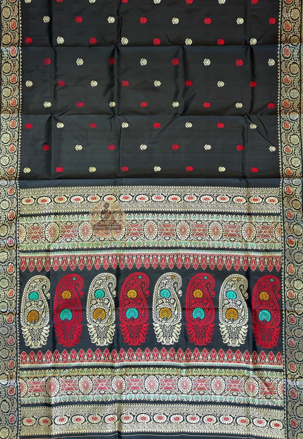 Close-up of finest handwoven Bishnupur Baluchari pallu showing highly intricate mythological figures, royal court scenes and narrative motifs woven thread by thread in pure silk — not printed or embroidered