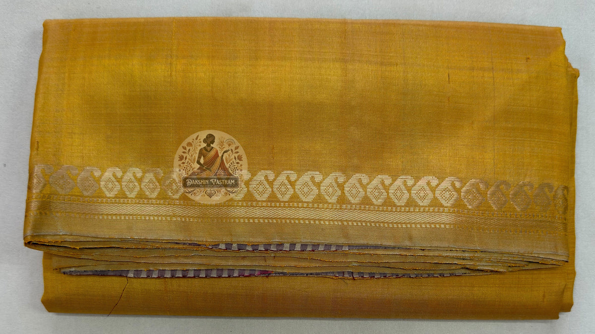 Macro close-up of individual hand-woven heritage motif on Bishnupur Katan Silk Saree by Dakshin Vastram, each pattern absorbed through generations at the loom in Bishnupur Bengal and woven with the knowledge of belonging