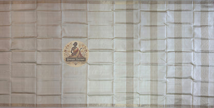 Overhead flat lay of pure silk saree from Bishnupur showing full 6-yard length, pallu detail and woven border