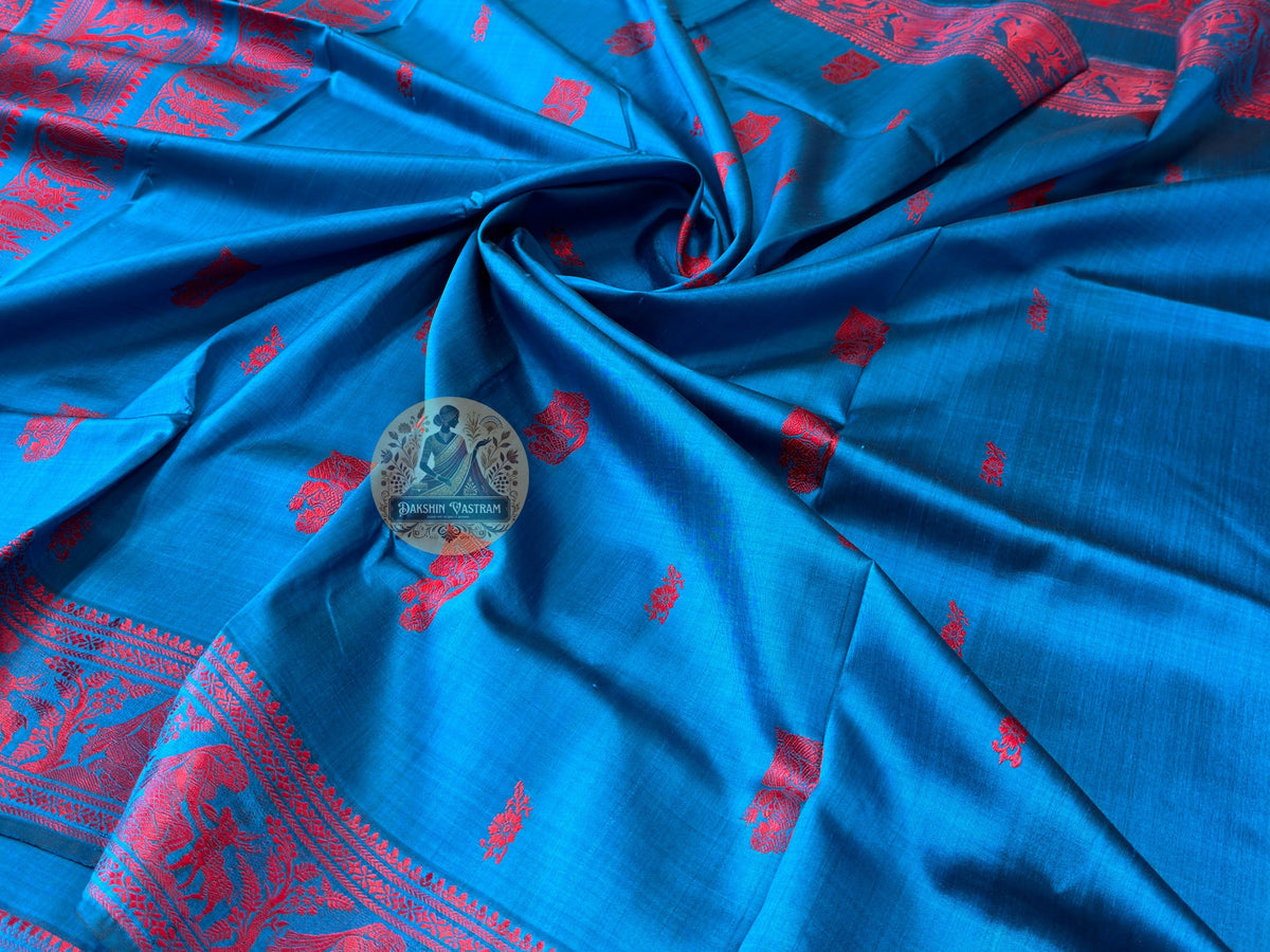 Bridal Baluchari silk saree in deep maroon with woven Mahabharata figures and rich crimson temple border