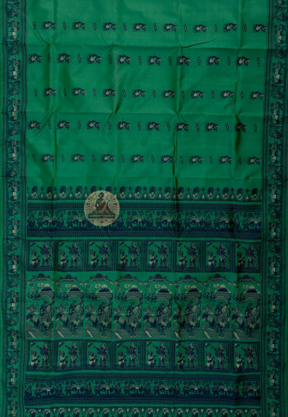 Close-up of handwoven Baluchari buti motifs on pure silk saree body, revealing the fine precision and natural luminosity of Bengal's three-hundred-year handloom storytelling tradition