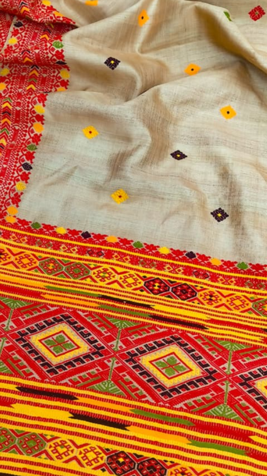 Front view of Pure Muga Silk Saree draped on model, showcasing the rare natural golden hue that deepens with every wear and the handwoven lustre of Assam's finest silk