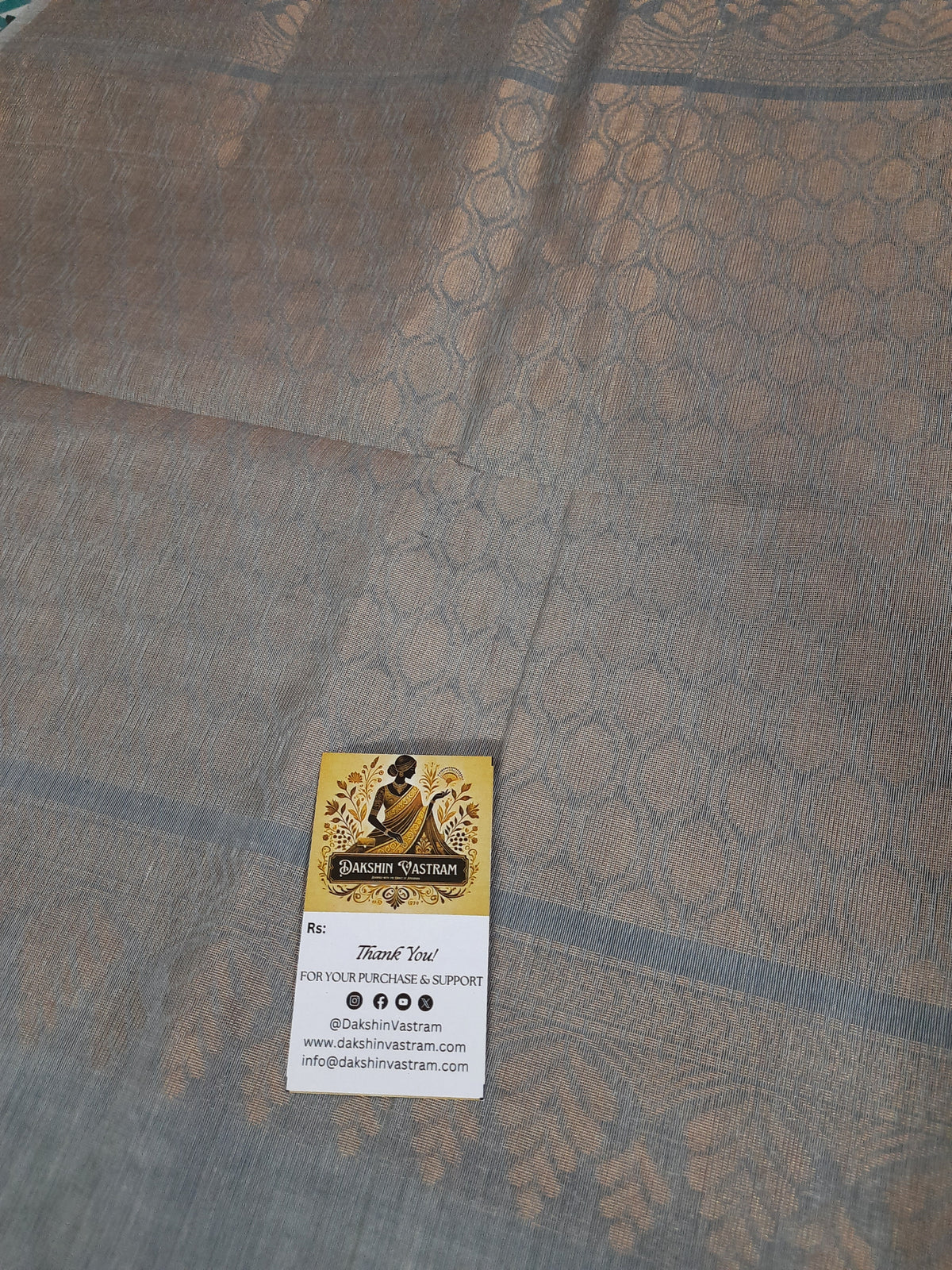 Fabric Side View: Side profile of handloom fabric with copper zari work, highlighting the softness and luxurious feel.