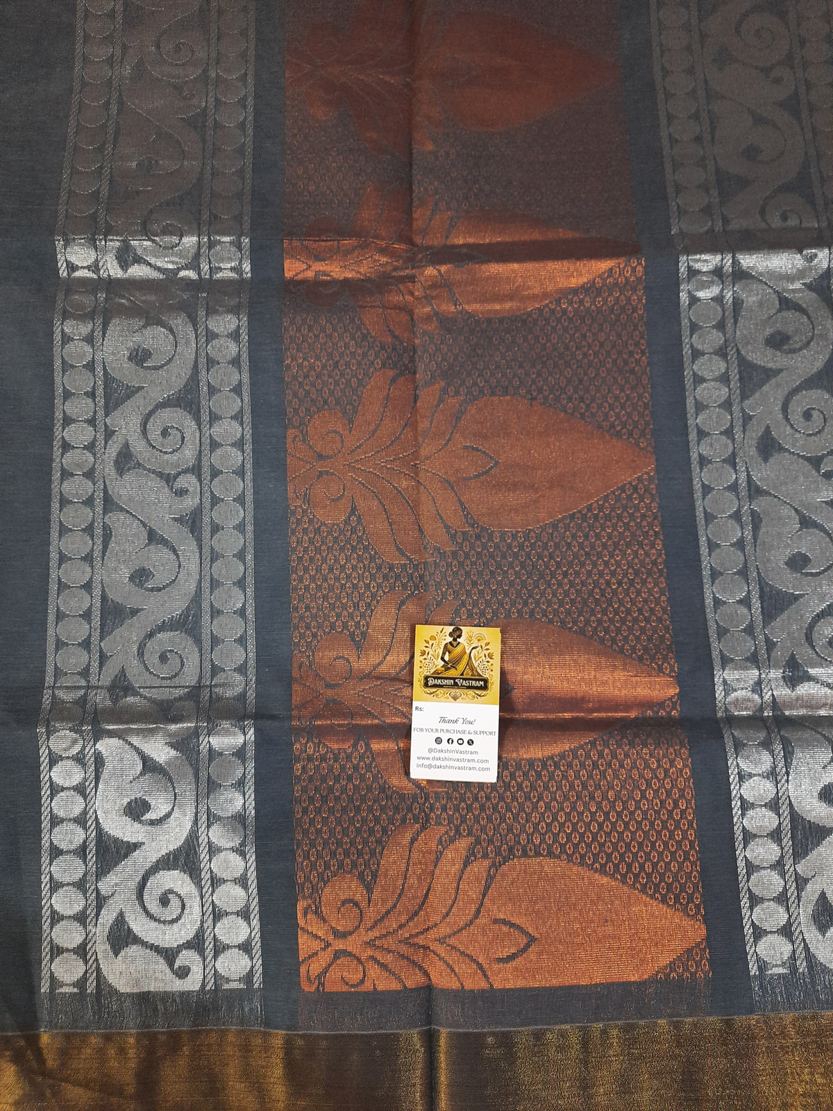 Handloom Copper Zari |  Expertly crafted, this Handloom Copper Zari fabric features a luxurious silver color woven with high-quality copper threads