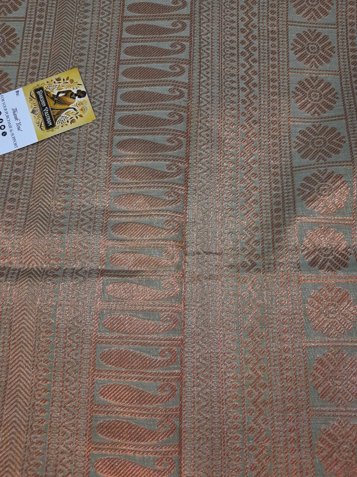 Side view of Handloom Organic Cotton with Copper Zari, highlighting fine craftsmanship and texture