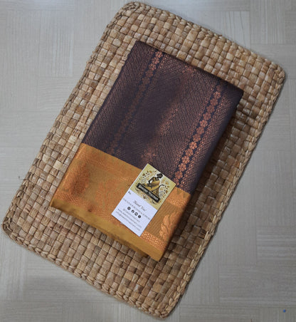 Saree Front View: Mow Silk Saree front view showcasing its rich color, luxurious fabric, and intricate borders.