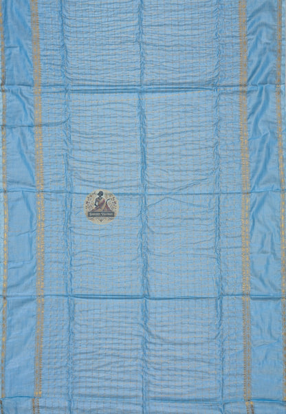 Full length view of pure cotton zari saree without blouse, displaying complete body, zari border, and pallu in detail