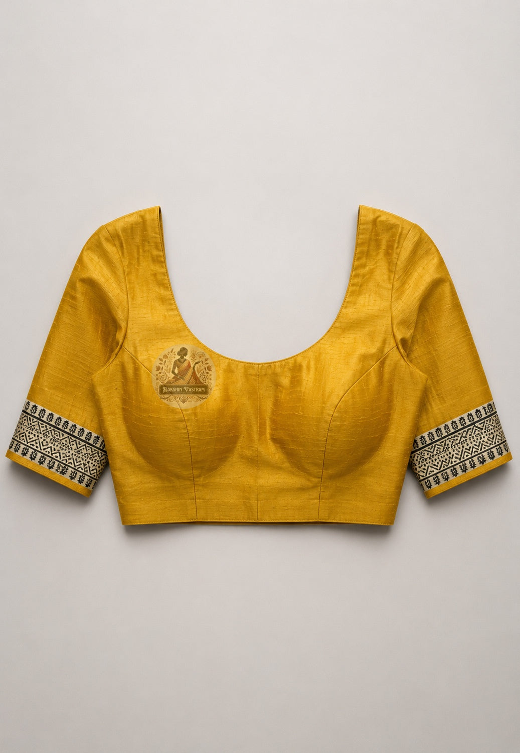 Close-up of Ghicha Tussar Silk blouse fabric showing irregular raw silk weave and natural warm tone, handcrafted by artisans for Karva Chauth and Indian wedding ceremonies