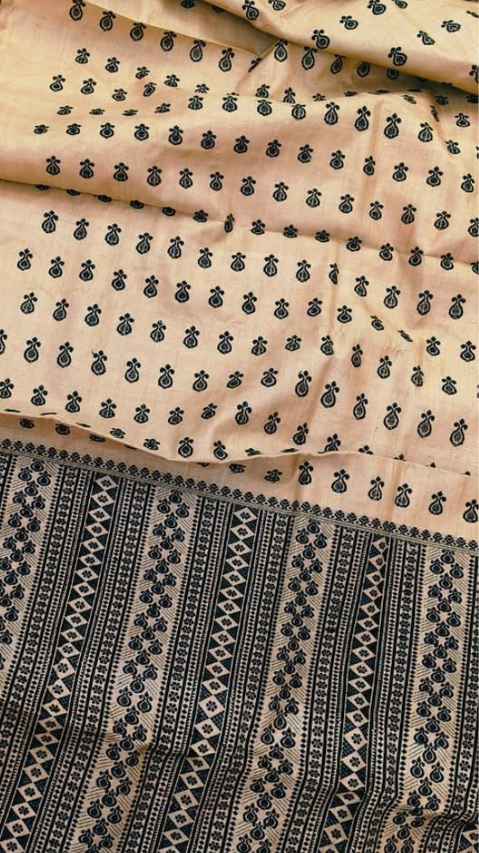 Detailed view of pit-loom woven Muga silk texture with self-deepening golden lustre – Assam handloom