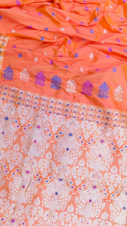 Close-up of Assam Mulberry Silk fabric showing smooth glass-like texture and natural sheen, authentic handloom weave