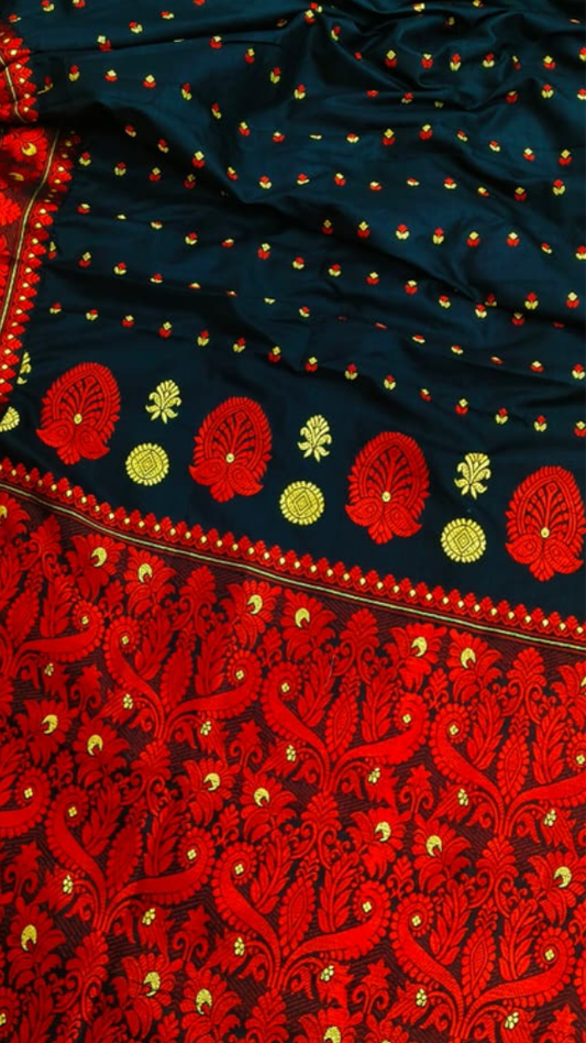 Close-up of traditional Assam geometric motifs handwoven into pure mulberry silk – Dakshin Vastram bridal saree UK