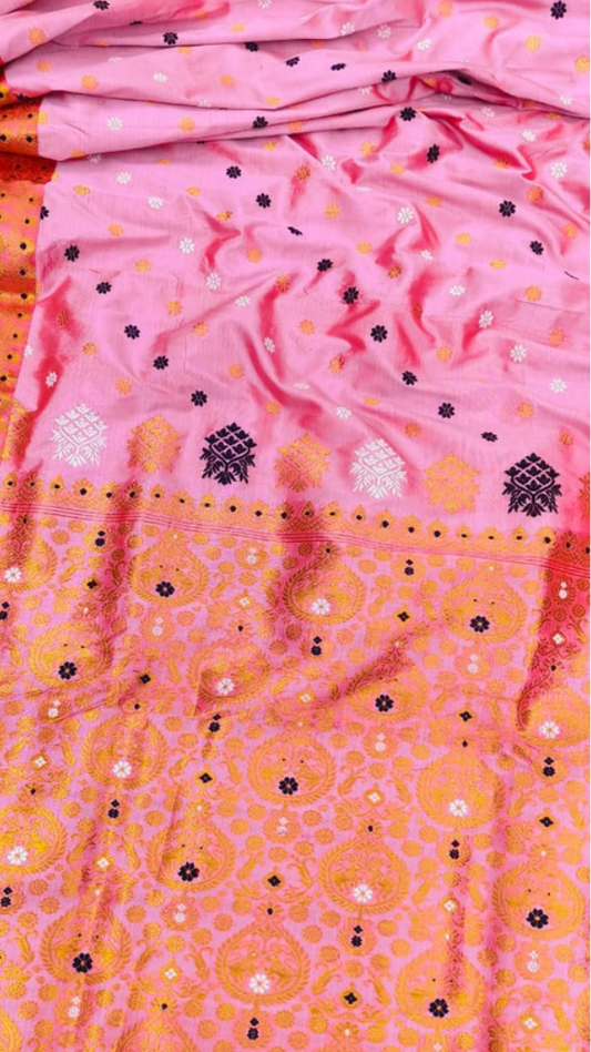 Close-up of pure mulberry silk weave from Sualkuchi, Assam — lustrous handloom texture by Dakshin Vastram