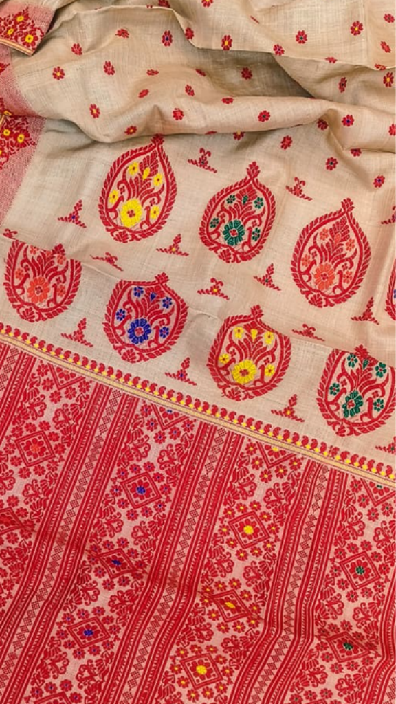 Side view of Pure Muga Silk Saree showing the structured yet fluid drape and warm natural golden sheen of handwoven Assam Muga silk in soft light