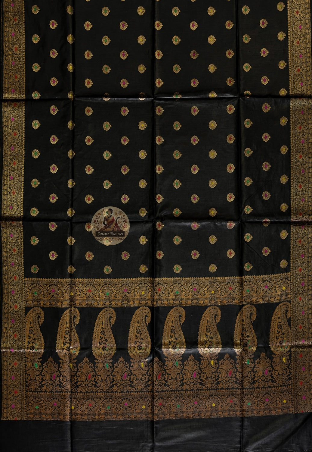 Close-up of handwoven zari border of Banarasi Muga Tussar Saree showing fine gold threadwork and intricate Banarasi weave pattern