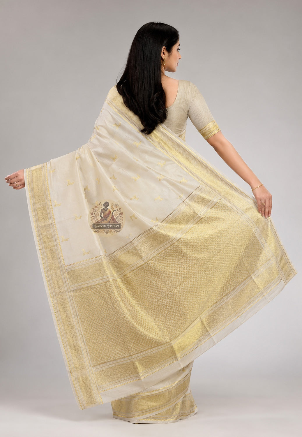 Woven-in traditional pattern border on authentic Jharkhand Tussar silk saree — thread-by-thread handloom craftsmanship, natural wild silk base, Dakshin Vastram
