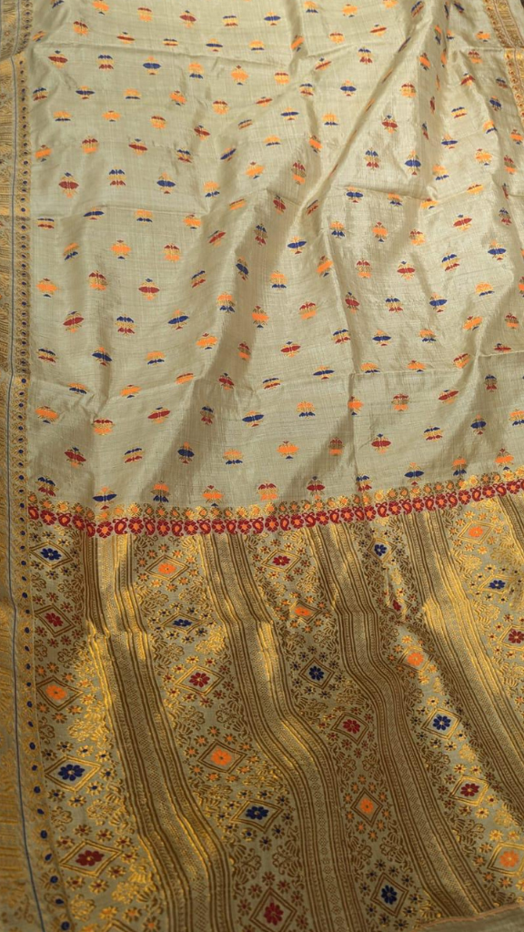 Woman in sustainable Muga Silk Saree at a conscious fashion event – ethical Indian silk delivered across UK