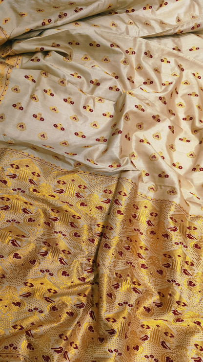 Saree connoisseur draped in collector's Muga Silk Saree – investment-grade Indian handloom delivered across UK