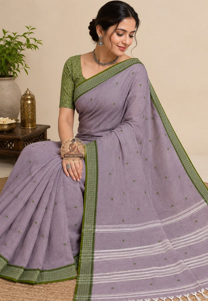 Rear view of handwoven cotton saree highlighting the pallu design and natural weave