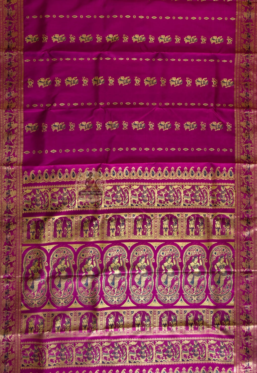 Flat lay of handloom Baluchari silk saree showing full mythological narrative pallu — Dakshin Vastram
