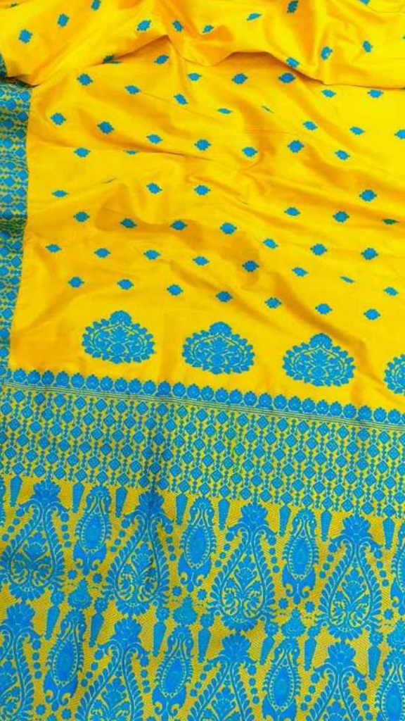 Close-up of running blouse fabric from Pure Assam Mulberry Silk Saree set, featuring coordinating plain handwoven silk with natural lustre and smooth finish