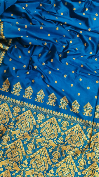 South Asian woman draped in handwoven Assam Mulberry Silk saree at festive celebration, elegant occasion wear for USA