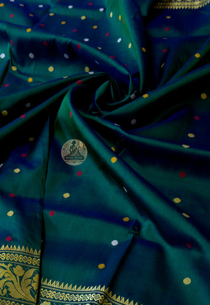 Close-up of Bishnupuri handwoven katan silk weave – warm natural silk lustre revealing every woman's most radiant self, intricate Bengal temple motifs woven permanently into pure silk