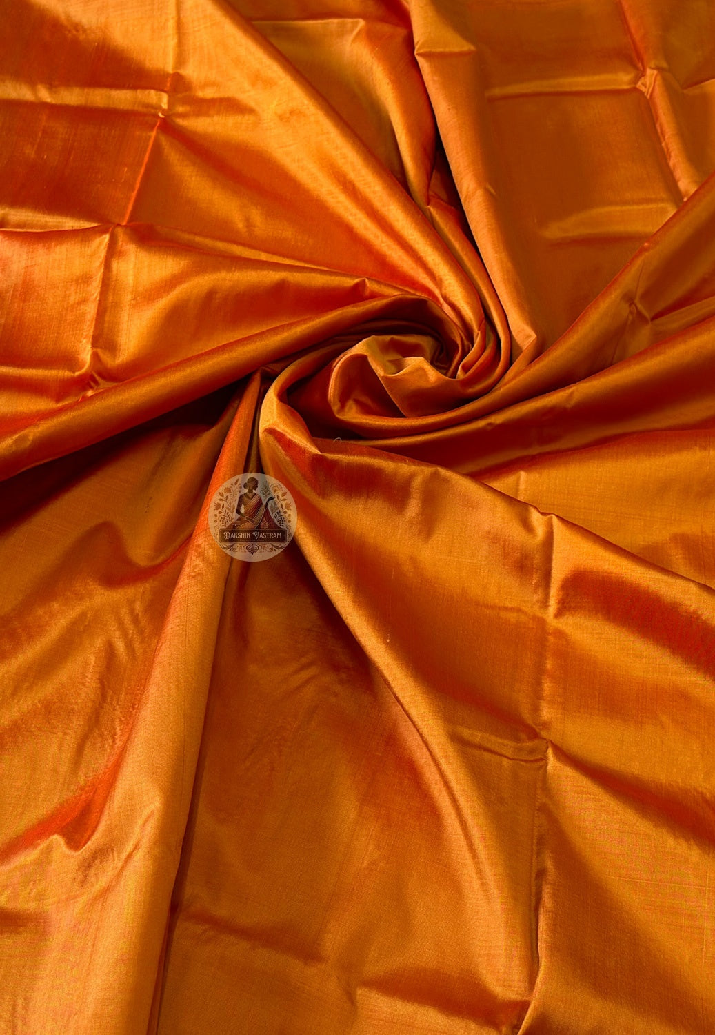 Dense supple Bishnupur silk fabric close-up showing weave structure and natural lustre