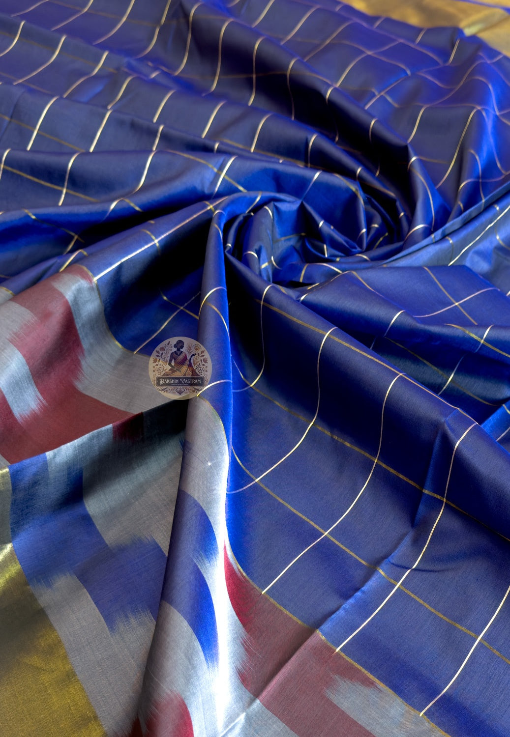 Macro close-up of handwoven motifs on Bishnupur Katan Silk Saree, revealing intricate Bengal temple and folk art patterns that emerge from within the pure silk weave