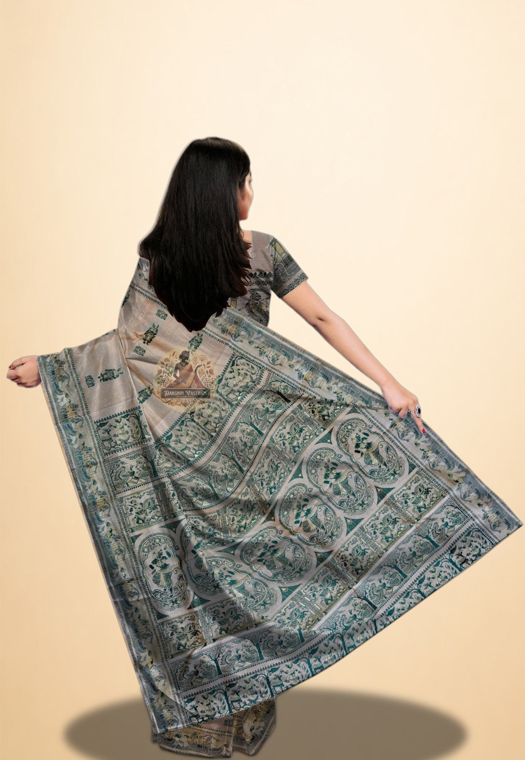 Close-up of hand-interlocked silk thread story motifs on a traditional Bengal Baluchari saree