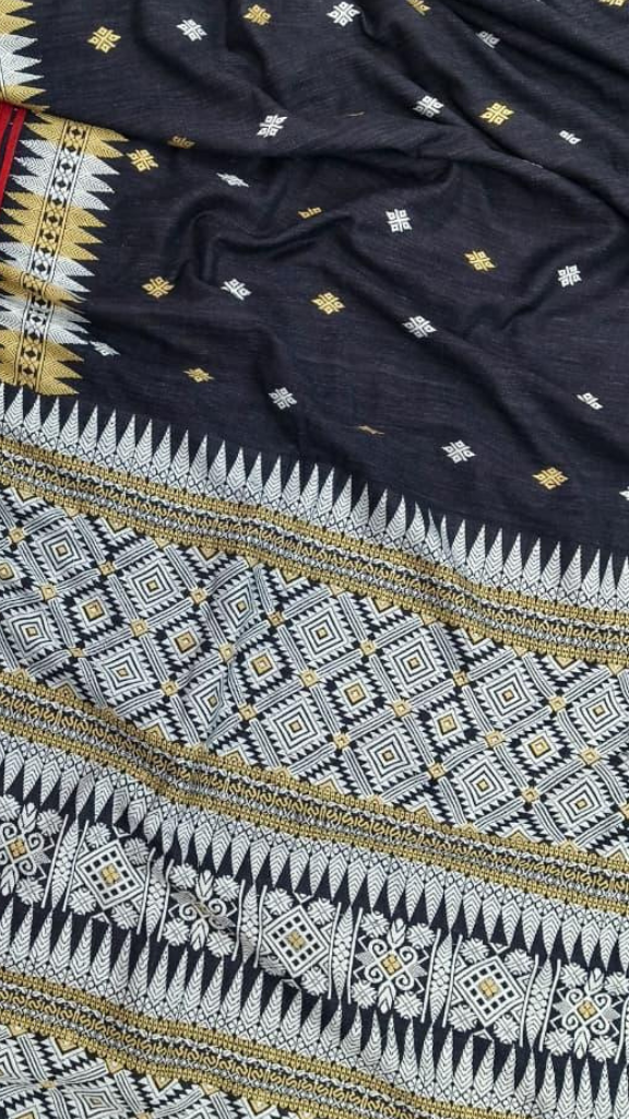 Flat lay of Dakshin Vastram Eri Silk Saree showing full length drape, handwoven border detail and natural earthy tones