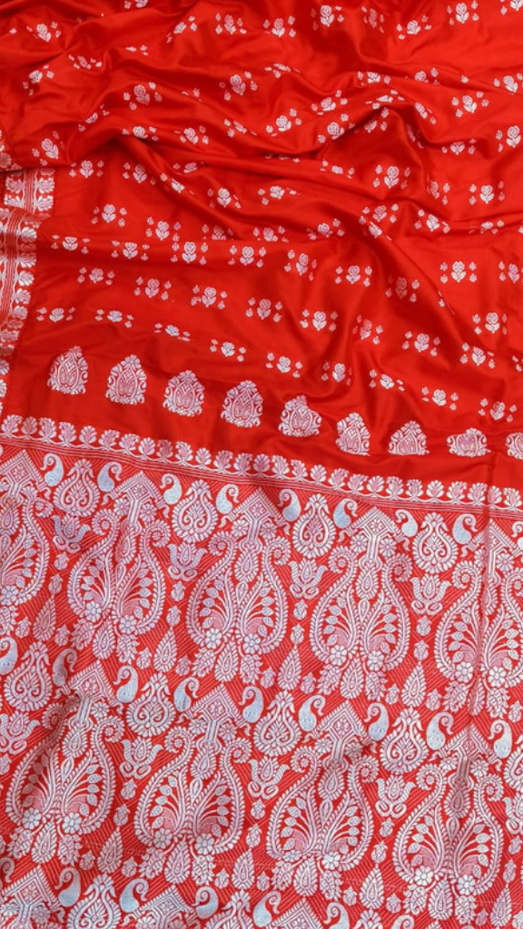 Flat lay of Assam Muga Silk Saree showing full length and natural sheen – ethically sourced handloom saree, Dakshin Vastram UK