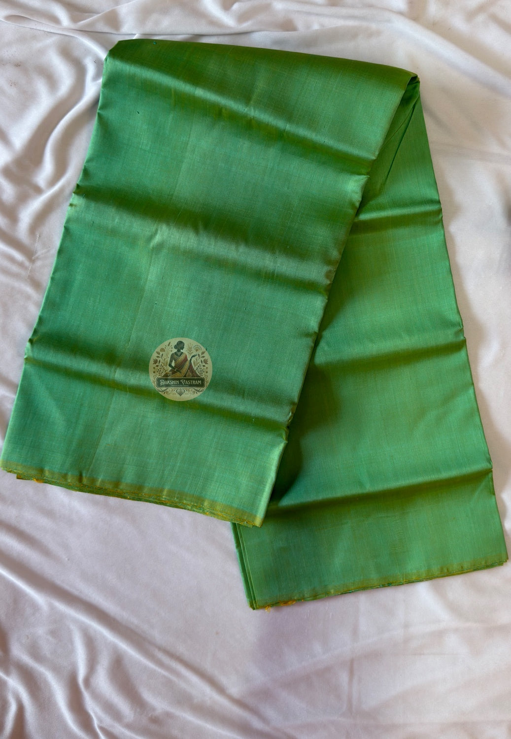 Close-up of Bishnupur handloom silk weave showing natural thread variation and texture