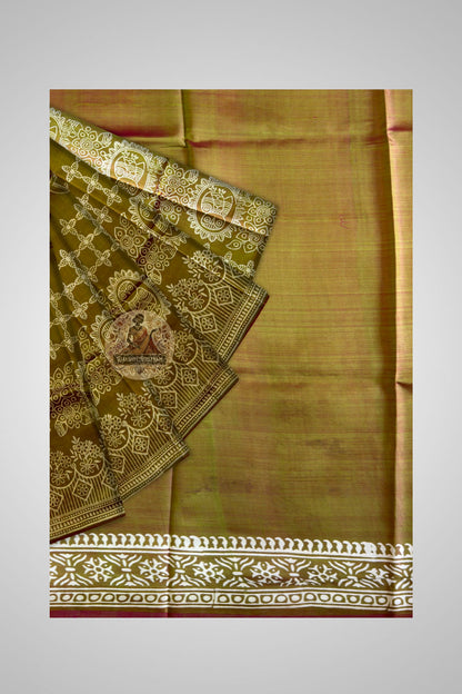 Bishnupur block print saree pallu detail – intricate hand-carved wooden block motifs on lustrous silk, rooted in Bengal's terracotta temple heritage