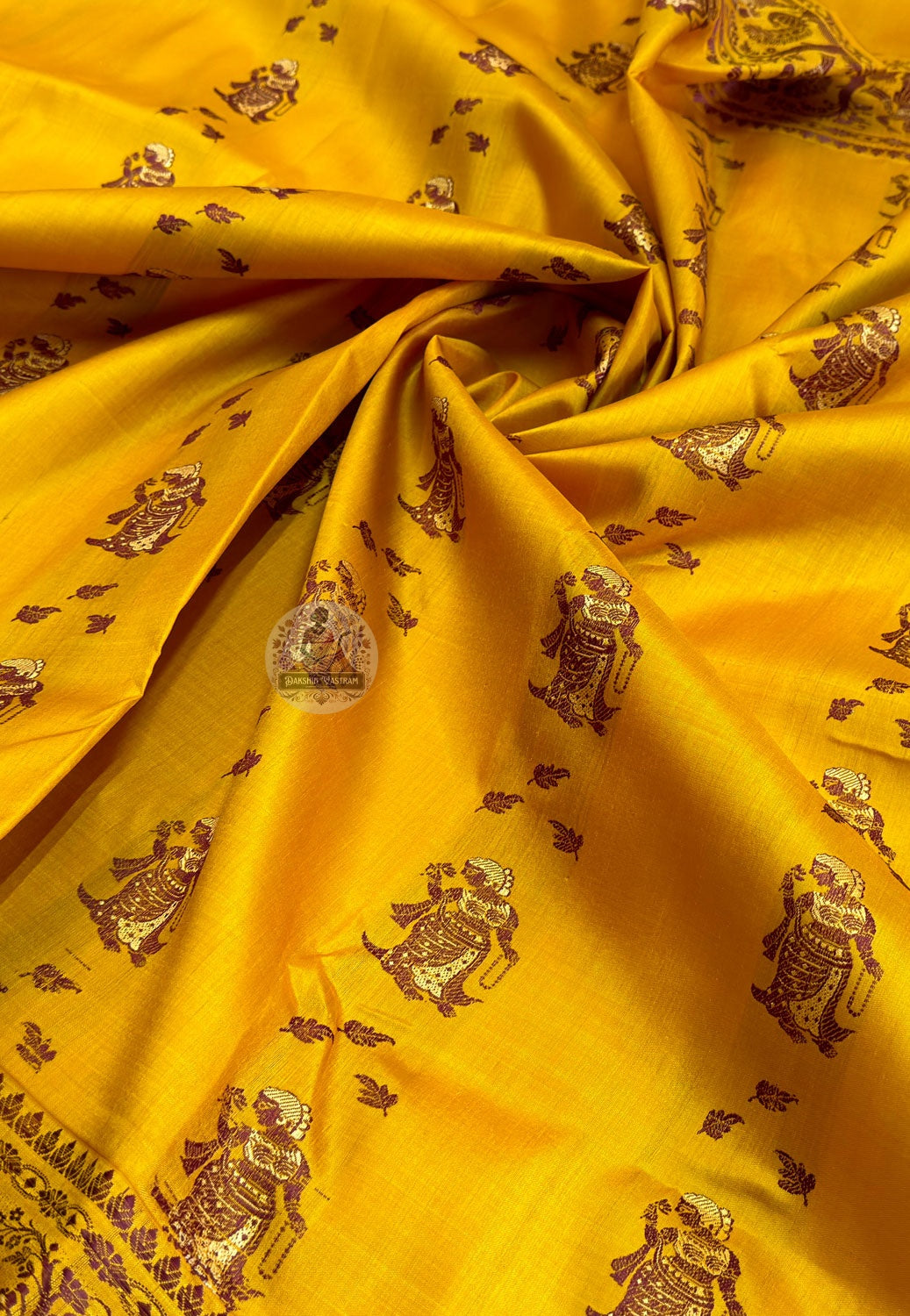 Full flat-lay view of Baluchari Pure Silk Saree showing complete handwoven silk body with Baluchari buti, traditional motif border, and richly illustrated sacred narrative pallu — a devotional offering in pure Bengal silk