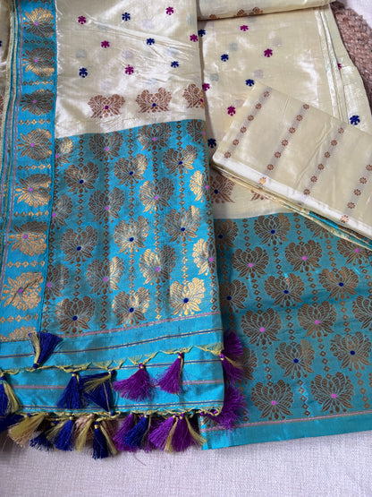 Front view of woman wearing Paat Mekhela Chador with ivory silk blouse Diwali diaspora cultural gala collector authentic Sualkuchi Assam silk