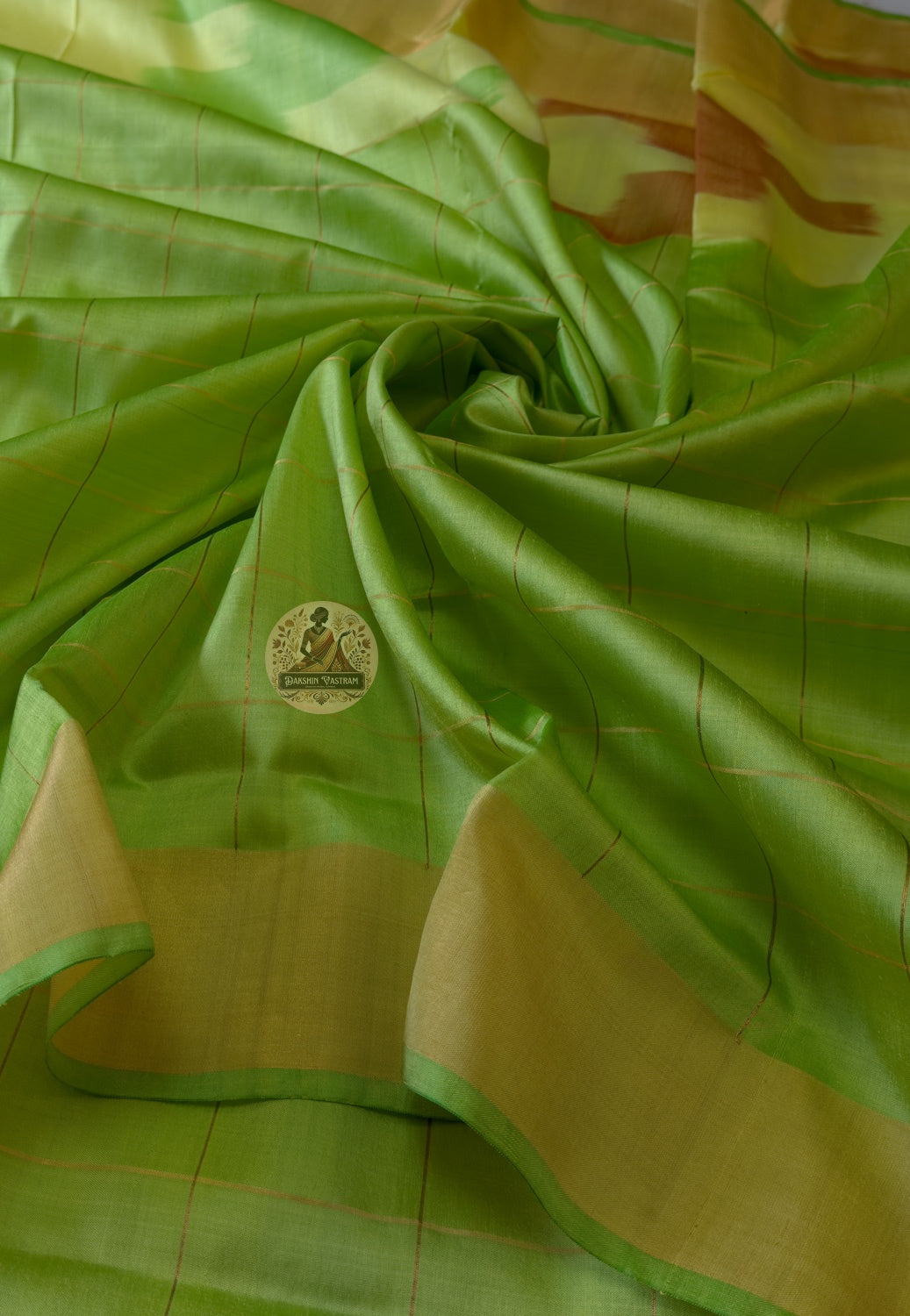 Macro close-up of handwoven motifs on Bishnupur Katan Silk Saree, revealing intricate Bengal heritage patterns woven permanently into the pure mulberry silk — a thread connecting generations
