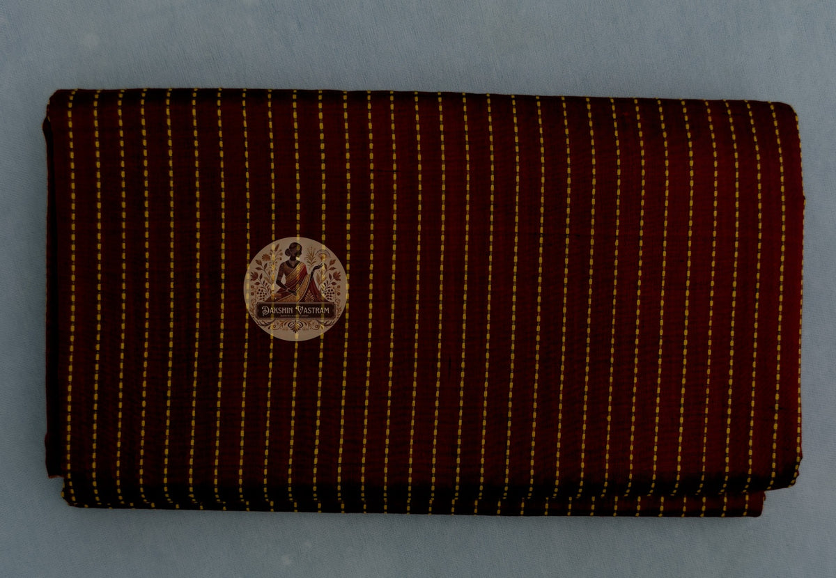 Detail view of Bishnupur Katan Silk Saree drape showing the structured fall and natural sheen of pure handwoven Katan silk with traditional Bengali motifs catching warm light