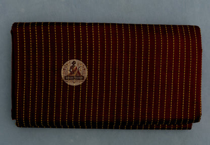 Detail view of Bishnupur Katan Silk Saree drape showing the structured fall and natural sheen of pure handwoven Katan silk with traditional Bengali motifs catching warm light