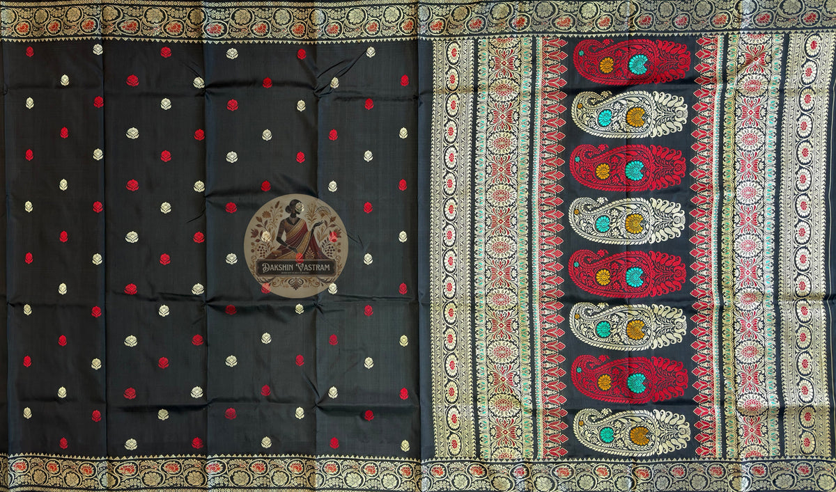 Close-up of pure silk fabric of premium Bishnupur Baluchari Saree showing exceptional natural luminous sheen, fine handwoven texture and soft drape of traditional Bengal silk
