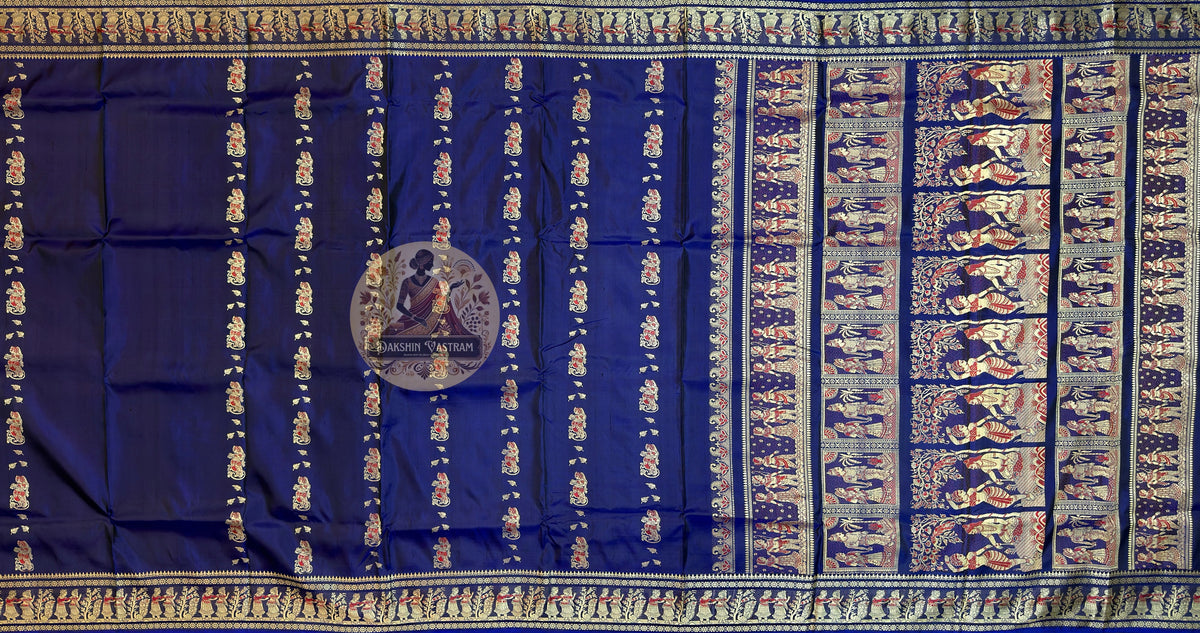 Detailed close-up of Baluchari Silk Saree border with handwoven narrative motifs from Bishnupur weaving tradition — each figure woven in silk, not printed or embroidered