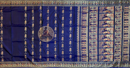 Detailed close-up of Baluchari Silk Saree border with handwoven narrative motifs from Bishnupur weaving tradition — each figure woven in silk, not printed or embroidered