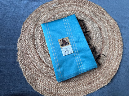 Shop semi raw silk saree online – Close-up of textured silk fabric