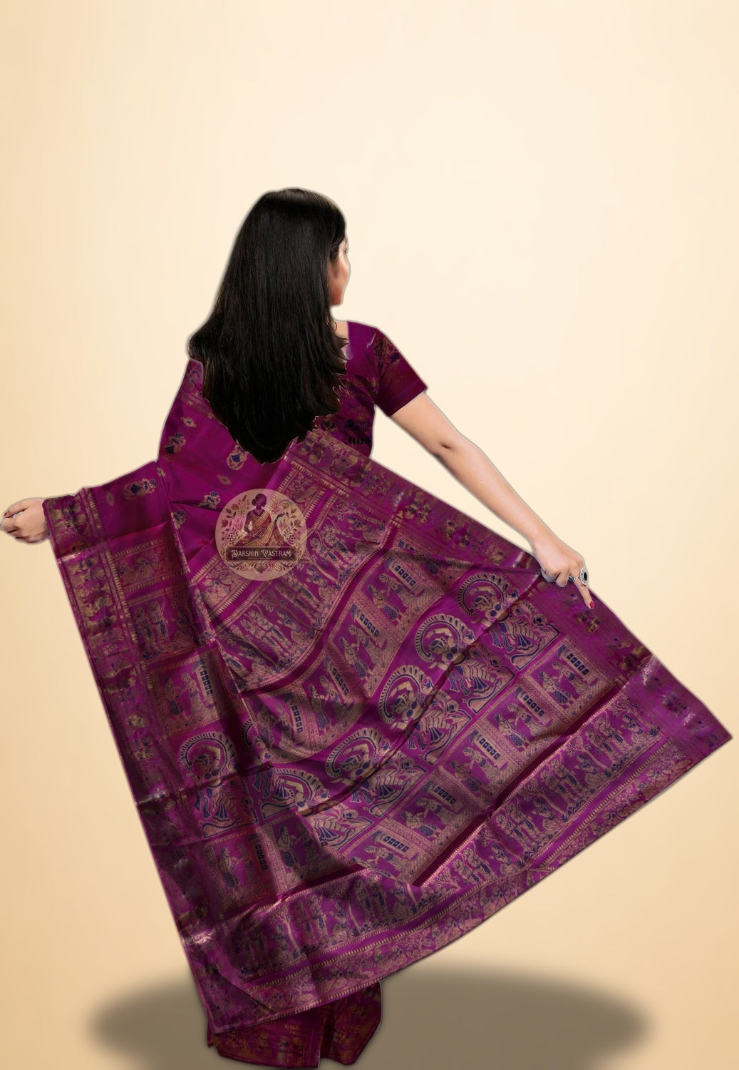 Indian woman draped in Swarnachari handloom silk saree with golden pallu detailing