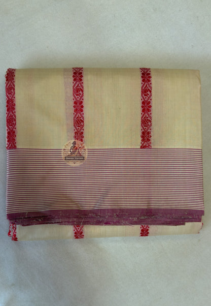 Full flat lay of Bhagalpur pit loom Tussar silk saree showing natural earthy gold body, woven tribal-inspired border and wild silk texture — Dakshin Vastram