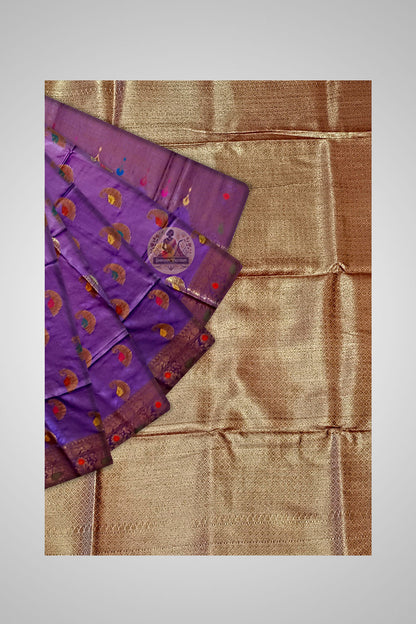 Discover Golden Muga Silk – Close-up of intricate silk detailing