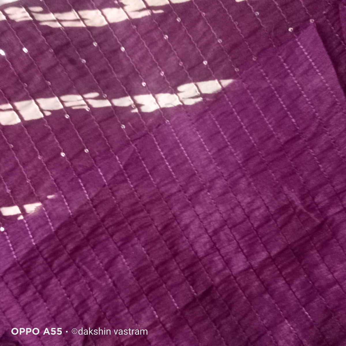 Saree Rear View: Rear view of Sequins Silk Saree, emphasizing the organic silk texture and sequins detailing.