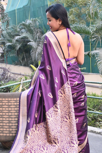 Close-up of Assam mulberry silk saree texture – lustrous golden weave from Sualkuchi, UK delivery	